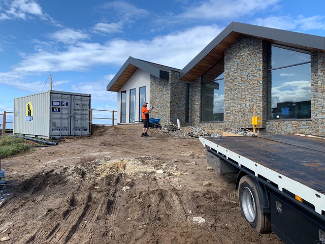 Shipping container used for site storage on a rural building site